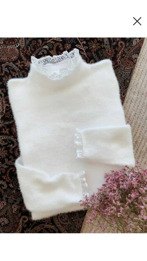 jersey decorado con puntilla en cuello y punos