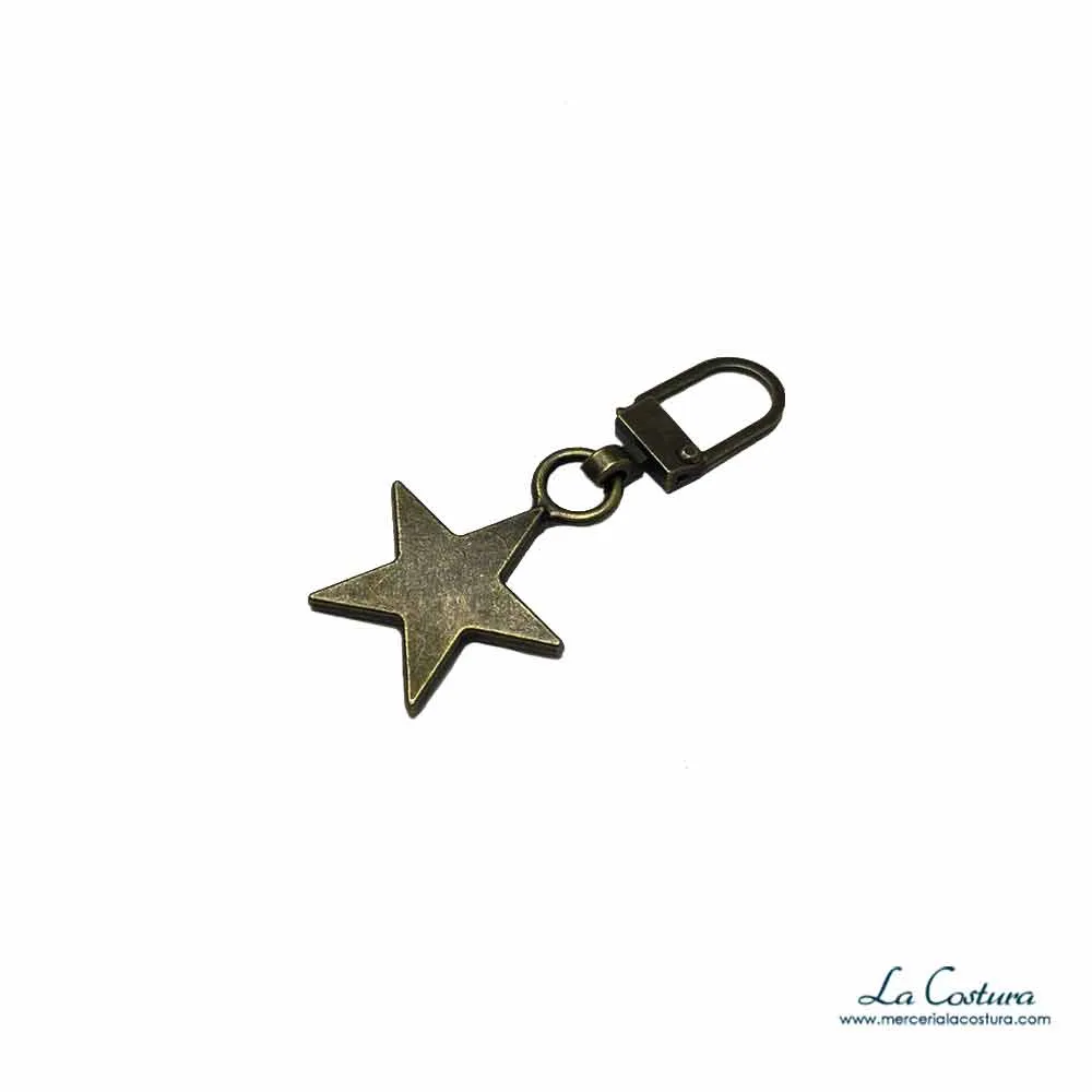 tirador-metalico-estrella-oro-viejo